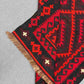Folded handmade Turkish Kilim rug – red and black wool flatweave with tribal design