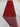 Folded red runner rug showing backside knots and quality Turkish weave