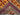 Side view of folded 3.6x6.4 handmade Baluchi wool rug showing weaving quality
