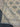 Folded view showing thickness and hand-knotted detail of 9.6x12.1 rug