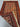 Handmade Turkish rug partially folded showing detailed weave