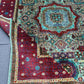 Folded Turkish Mamluk rug showing texture and knotting from side