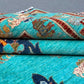 Folded view of 6x8 Tree of Life rug showing texture and design