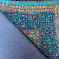 Side view of folded vintage Mamluk rug – knotted wool and silk texture