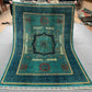 Full top view of unique 6x7 handmade Turkish Mamluk rug in teal and gold