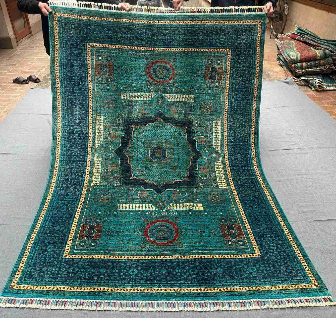 Full top view of unique 6x7 handmade Turkish Mamluk rug in teal and gold