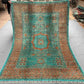 Full top view of Turkish handmade 6x8 Mamluk rug in green, orange, and turquoise