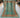 Full top view of Turkish handmade 6x8 Mamluk rug in green, orange, and turquoise