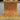 Top-down view of Afghan Turkish rug 2.10x3.11 ft with bold geometric oriental pattern in gold, red, and green