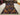 Complete top view of handwoven Baluchi tribal rug with animal patterns