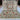 Full top-down view of gray floral Sultani Persian wool carpet