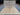 Full top view of handmade beige and ivory Ziegler Persian area rug