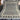Full top-down view of large handmade Turkish Oushak wool rug in black and beige