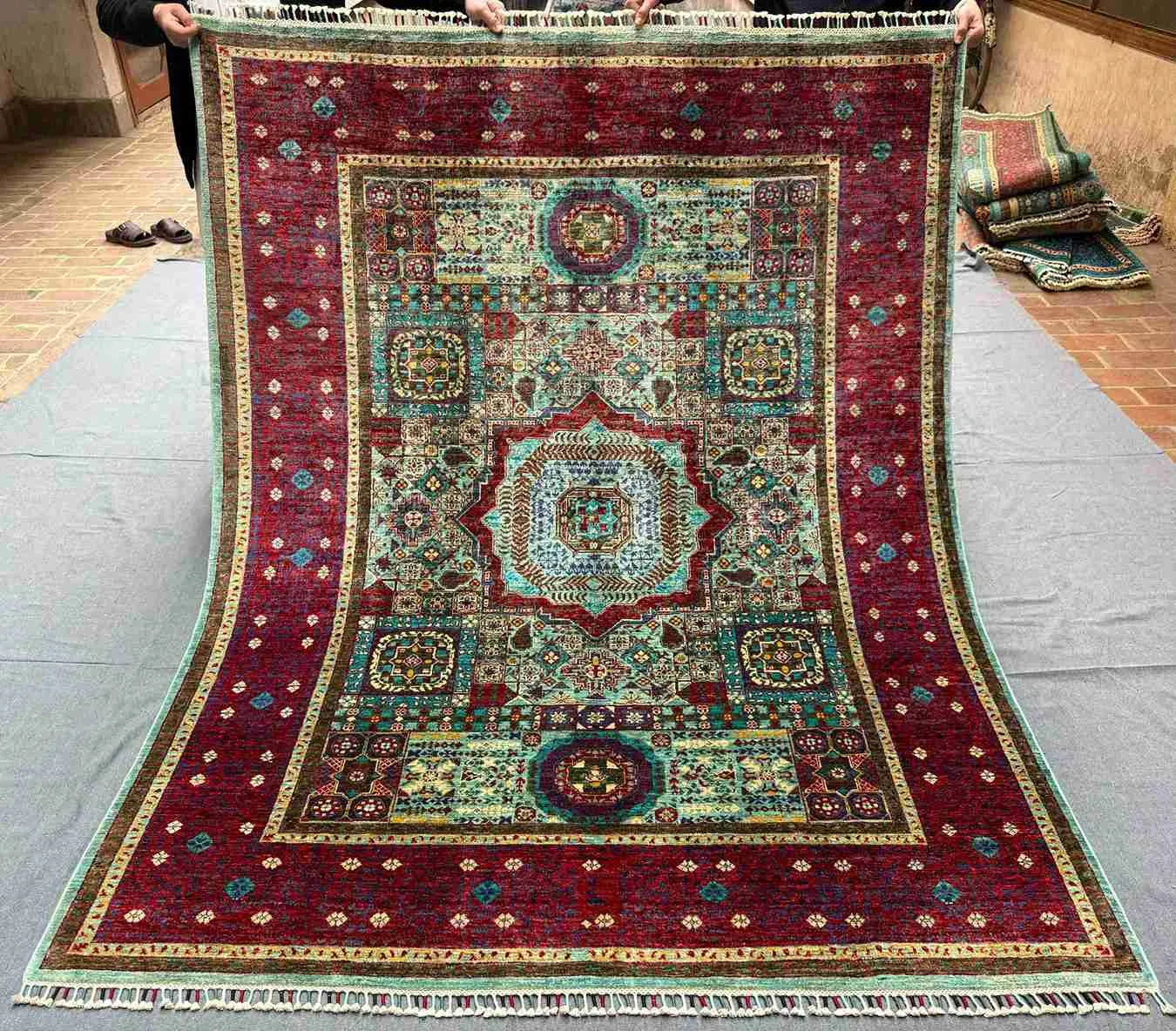 Full top view of 6x8 handmade Turkish Mamluk rug in red and teal