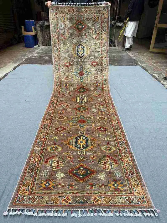 Full top-down view of 2.10x9.7 handmade Waziri runner rug