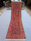 Complete view of 2.9x9.3 antique Turkish kilim runner with tribal design