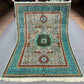 Full overhead view of 5x8 handmade Mamluk Oriental rug – turquoise and green wool silk