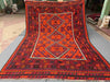 Full top-down view of handmade 8x12 Turkish Kilim rug – red and black geometric wool flatweave.