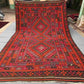 Full overhead view of 8x12 Turkish Kilim rug – vintage red and black oriental wool flatweave carpet.