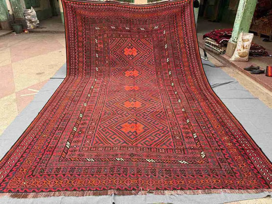 Full top-down view of 8x13 handmade Turkish Kilim rug – red and black geometric tribal wool carpet.