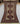 Full view of authentic handmade Turkish rug with tribal geometric design