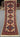 Full view of authentic Turkish-Kazakh beige wool runner rug
