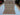 Full top-down view of handmade 5x7 Oriental rug with floral and geometric patterns