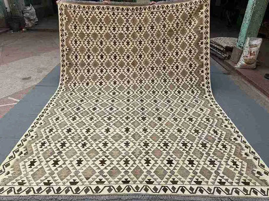 Full view of handmade Turkish Kilim rug – geometric wool flatweave in neutral earthy tones.