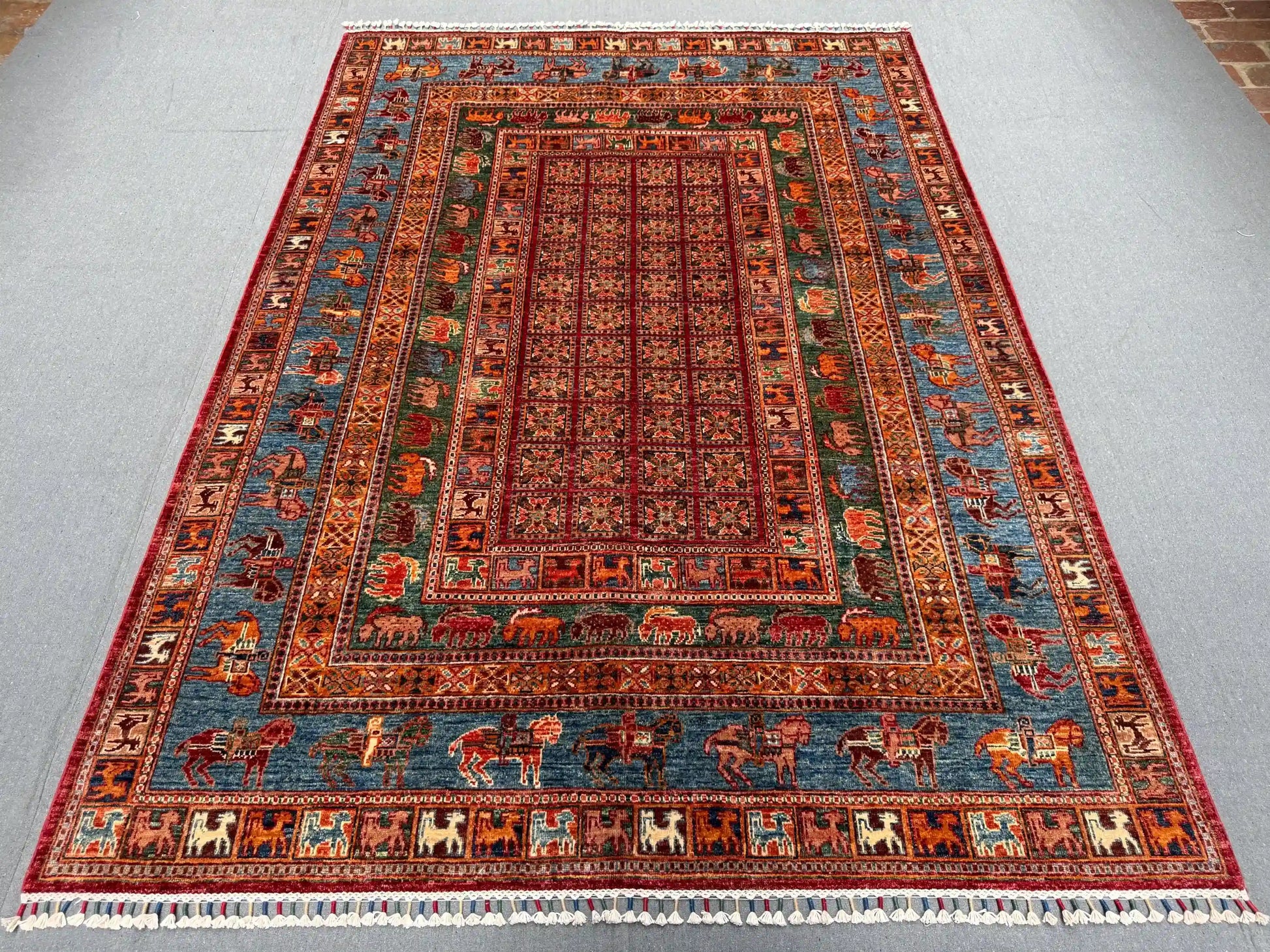 Full top view of handmade Pazyryk rug with tribal design