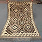 Full view of small handmade Turkish Kilim rug – traditional flatweave with tribal motifs.