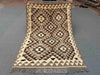 Full view of small handmade Turkish Kilim rug – traditional flatweave with tribal motifs.