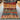 Full top view of handwoven wool Persian rug with forest and wildlife scene