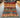 Full top view of handwoven wool Persian rug with forest and wildlife scene