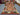 Full view of 4x6.2 ft handmade red & green Kilim rug with tribal diamond pattern
