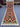 Full view of 2x6.5 ft red and green geometric Kilim runner rug