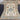 Complete view of large Turkish Oushak wool rug in blue and beige