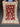 Full top-down view of authentic handmade red Oriental wool rug