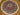 Complete top-down view of 6ft Persian round handmade silk rug