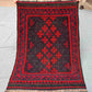  Full view of handmade small red Kilim rug – geometric wool flatweave, traditional and boho-style.