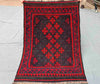  Full view of handmade small red Kilim rug – geometric wool flatweave, traditional and boho-style.