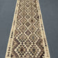 Full view of Turkish handmade Kilim runner rug – neutral tones with geometric design for hallway or rustic space.