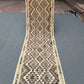 Full view of Turkish handmade Kilim runner rug – neutral tones with geometric design for hallway or rustic space.