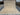  Complete top-down view of 8x10 beige and blue Ziegler rug