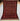 Full view of authentic handmade Turkish red and brown wool rug with geometric design