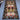Geometric wool Kilim rug styled on hardwood flooring.