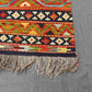 Corner detail of multicolor Khorjin Kilim rug – large handwoven geometric wool flatweave.