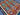 Detailed close-up of geometric motifs on handmade Kilim rug