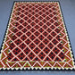  Floor view of red tribal kilim rug – geometric flatweave wool carpet