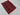 Floor view of small geometric Kilim rug – tribal red tones and handwoven wool texture.