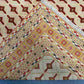 Half-folded Persian Afghan kilim showing handwoven thickness